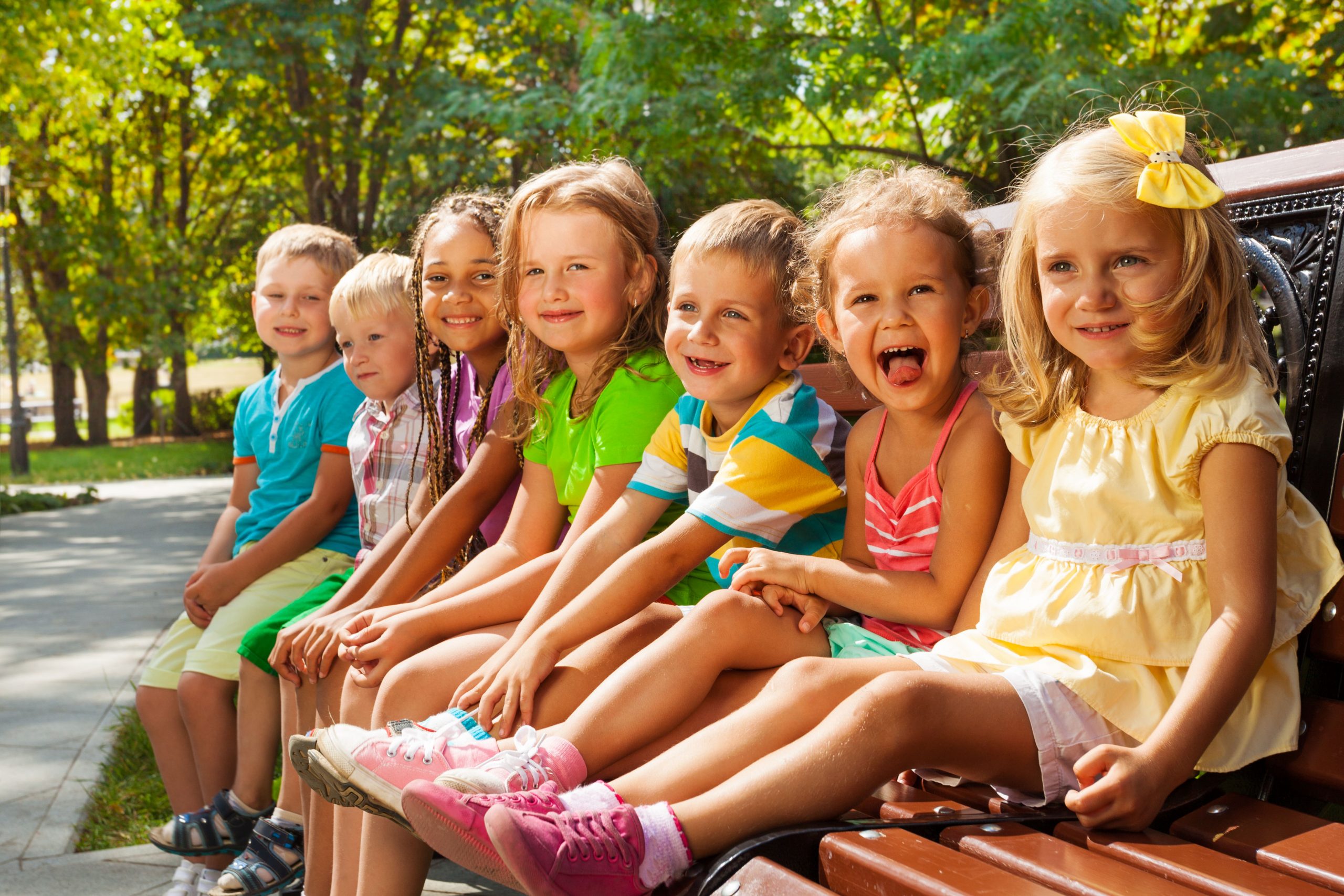 31196165 - kids on summer park bench